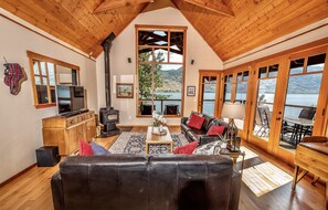 Open main floor with lake views from every window