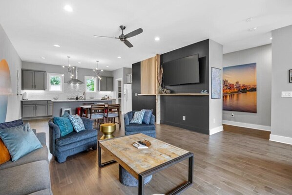 Living Room to kick back, relax and watch the game as the girls get ready for a big night out!