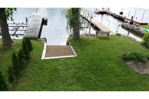 Waterfront with dock and beach area