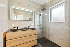 Modern bathroom with walk-in shower