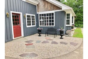 Entryway with outside bench.