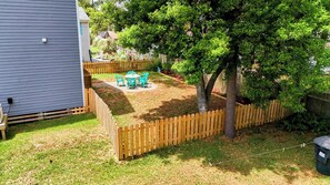 New fenced in back yard.