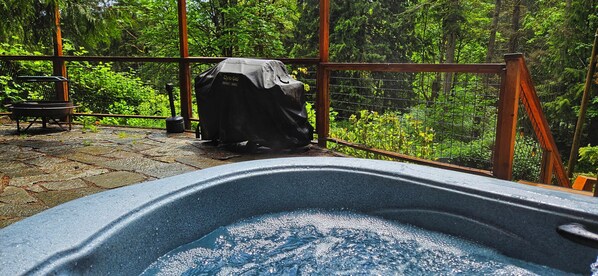 Relax in the 3 person hot tub.