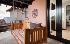 Balcony , hanging couch.