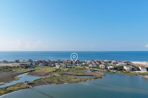 Located between the Gulf of Mexico and Little Lagoon in Gulf Shores
