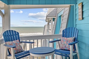 Balcony seating with ocean/beach views