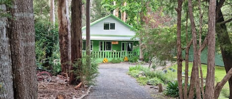 House is nicely tucked away from the road.