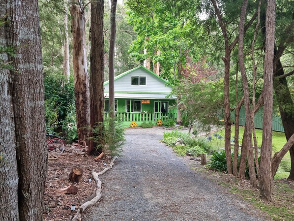 House is nicely tucked away from the road.