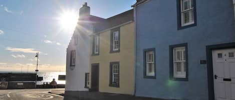 Oyster Cottage is steps from the sea