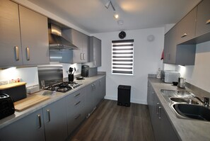 The fully fitted kitchen is well equipped