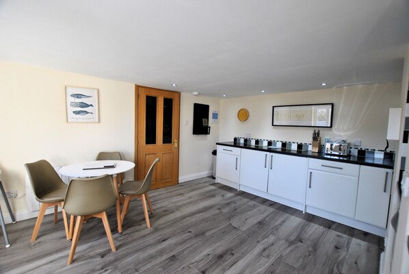 The dining kitchen is particularly spacious