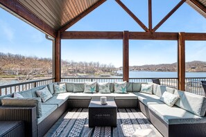 Elevated deck offers a screened in setting for pest free fresh air & lake views