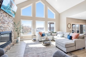 Wall of windows creates amazing views from the living area