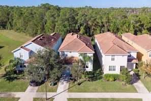 Bright, sunny front entry with parking available for 1 vehicle