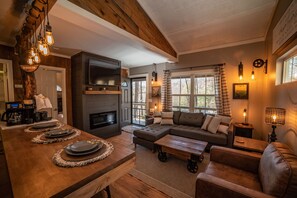 Gorgeously appointed living room with electric fireplace feature