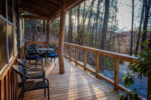 Wrap around deck with patio dining area