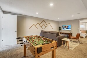 Get your game on! The foosball table in the downstairs family room is great for kids and adults alike.
