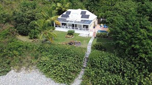 A birds eye view of Belle Mer and stairs to Klein Bay beach