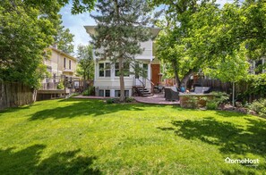 Enjoy drinks on the flagstone patio while the kids play