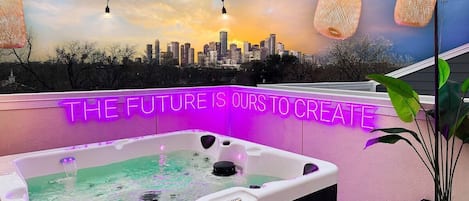 Enjoy our large hot tub from our rooftop terrace while taking in these breathtaking views of the Houston skyline.