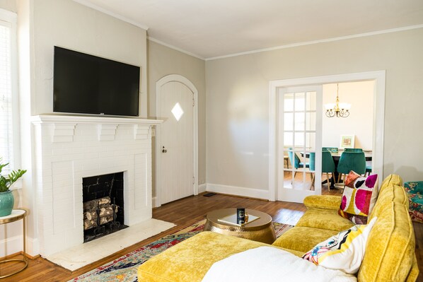 Living room with view into dining room