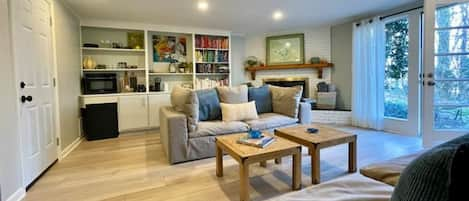 Living room with with lots of light and door onto the patio