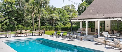 This huge backyard is one highlight of the home with a pool and tons of seating.