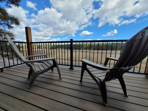 Balcony seating with view of the meadow