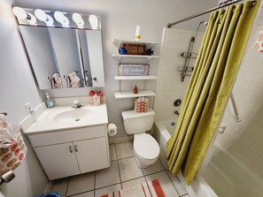 Master bathroom with tub/shower combo