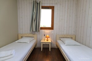 Get a peaceful night sleep in our cozy bedroom.