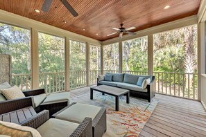 Ceiling fans and comfy furniture make the perfect spot for morning coffee and afternoon cocktails