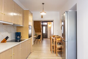 The kitchen with the dinning table