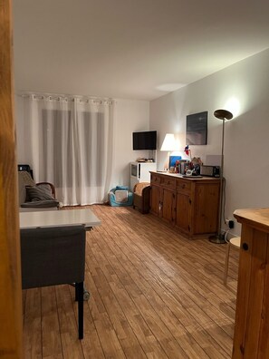 The whole living room from the entryway