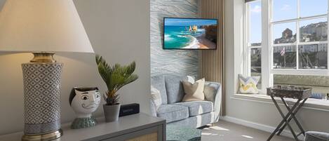 Relax in the comfortable living room and enjoy the harbour views