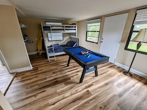 Bonus room with pool table.