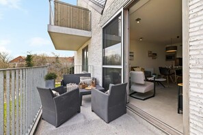 South facing terrace with lounge and dining area