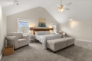 king-size bed, a flat-screen TV, an elegant electric fireplace, and a private ensuite bathroom. Enjoy a peaceful and rejuvenating sleep in this cozy haven.