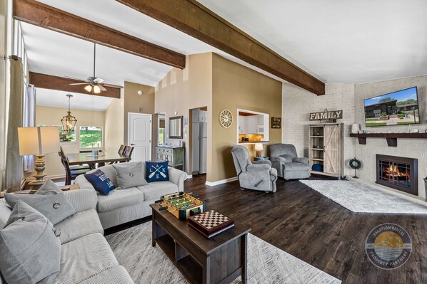 Spacious open-plan living area with a modern kitchen.