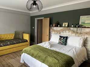 Main bedroom with King sized double bed and sofa bed that sleeps 2