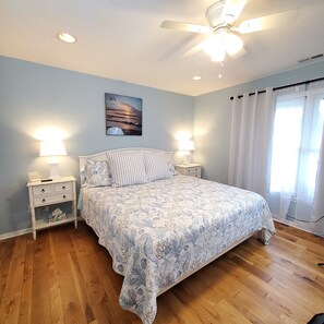 King BDRM: nightstands w/USB, dresser, chair, shelves, lg. closet, ROKU TV