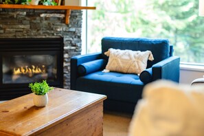 Cozy living area with TV & gas fireplace