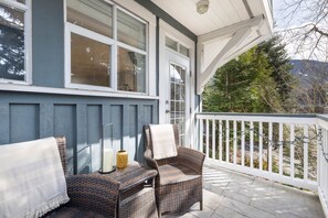 Sip your morning coffee on the private balcony with a stunning mountain backdrop