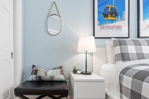 Sleep soundly in this peaceful master bedroom, where comfort meets style