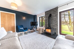 Cow Barn sitting room with log burning stove