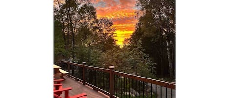 Amazing sunsets from the 40' long front deck, complete with propane heater