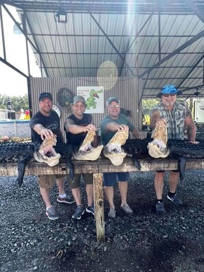 Amazing guests who participated in an alligator hunt while staying at The Summertime. Shared with permission.