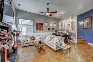 Enjoy the open and inviting family room with a ceiling fan.
