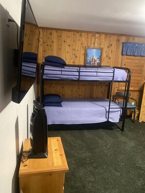 Bedroom #1 is located on the 1st floor.
has 2 sets of bunk beds and a single 