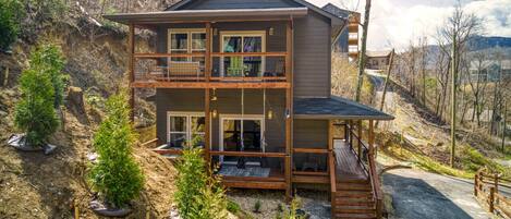 Balcony and Porch of property with hot tub