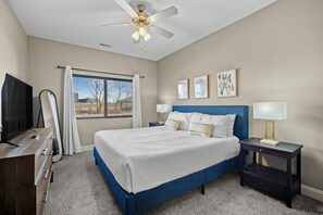 A king sized bed, smart TV, room darkening curtains and more are provided.